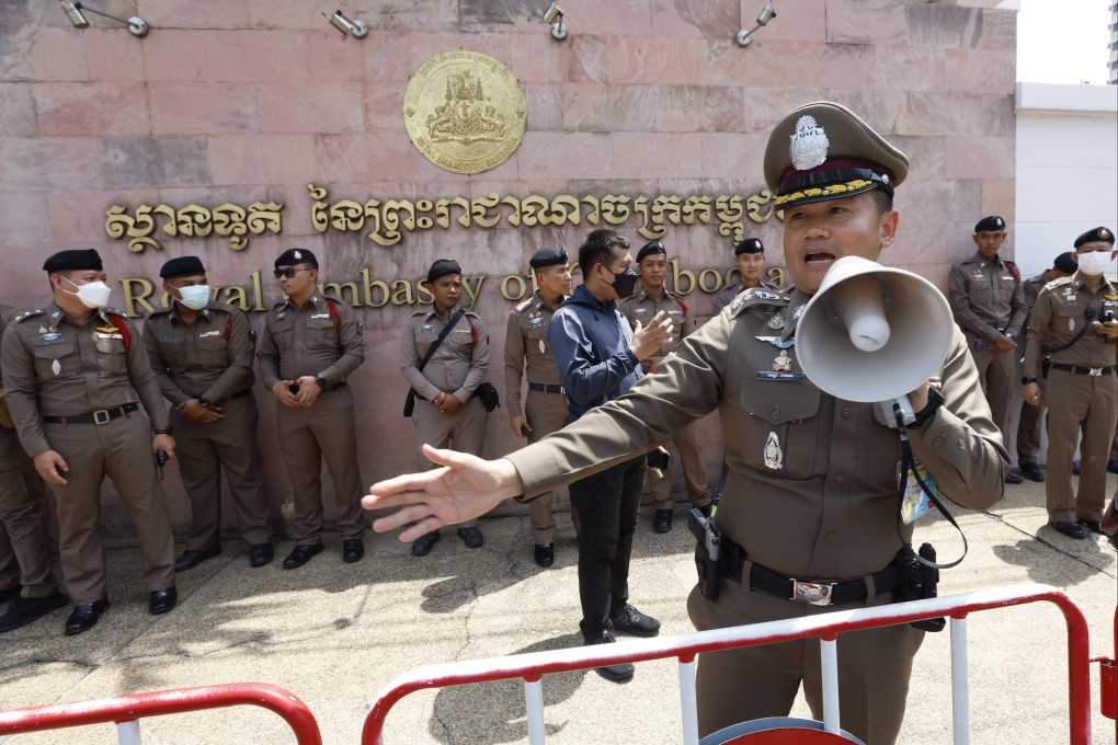 Thai police officers control the area outside the Cambodian Embassy as the nationalist gather to protest over the Thai-Cambodian border dispute, in Bangkok, Thailand on Friday. Photo: EPA-EFE