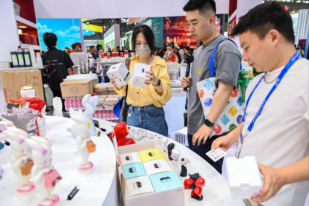 Visitors at a trade show in Shenzhen on May 22. The southern Chinese exports and tech hub aims to use exhibitions as part of its plan to boost consumption. Photo: Xinhua