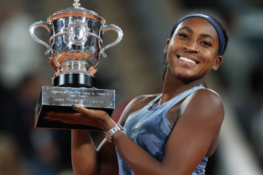 Coco Gauff holds up the French Open trophy after winning her second grand slam title against Aryna Sabalenka at Roland Garros, Paris on Saturday. Photo: Xinhua