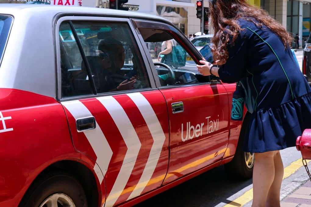 An Uber taxi waits for passengers in Tsim Sha Tsui. Uber’s Andrew Byrne said Hong Kong could learn from Australia’s A$1.2 levy on ride-hailing and taxi services to compensate cabbies. Photo: Jelly Tse