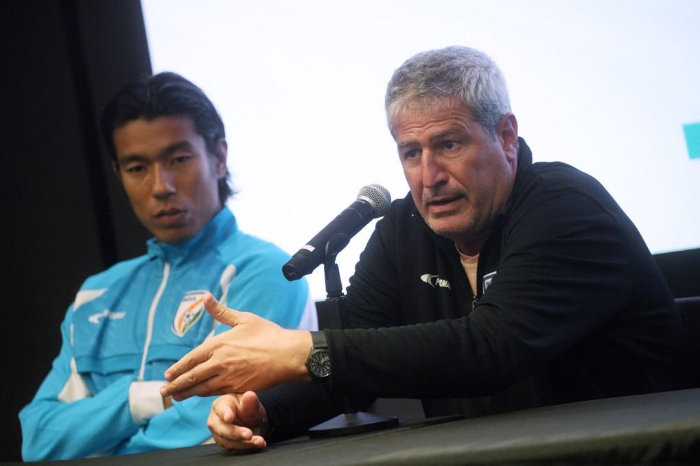India coach Manolo Marquez (right), sat alongside player Chinglensana Singh, has his say about Hong Kong’s naturalised players at a pre-match press conference at Kai Tak Stadium. Photo: Sun Yeung