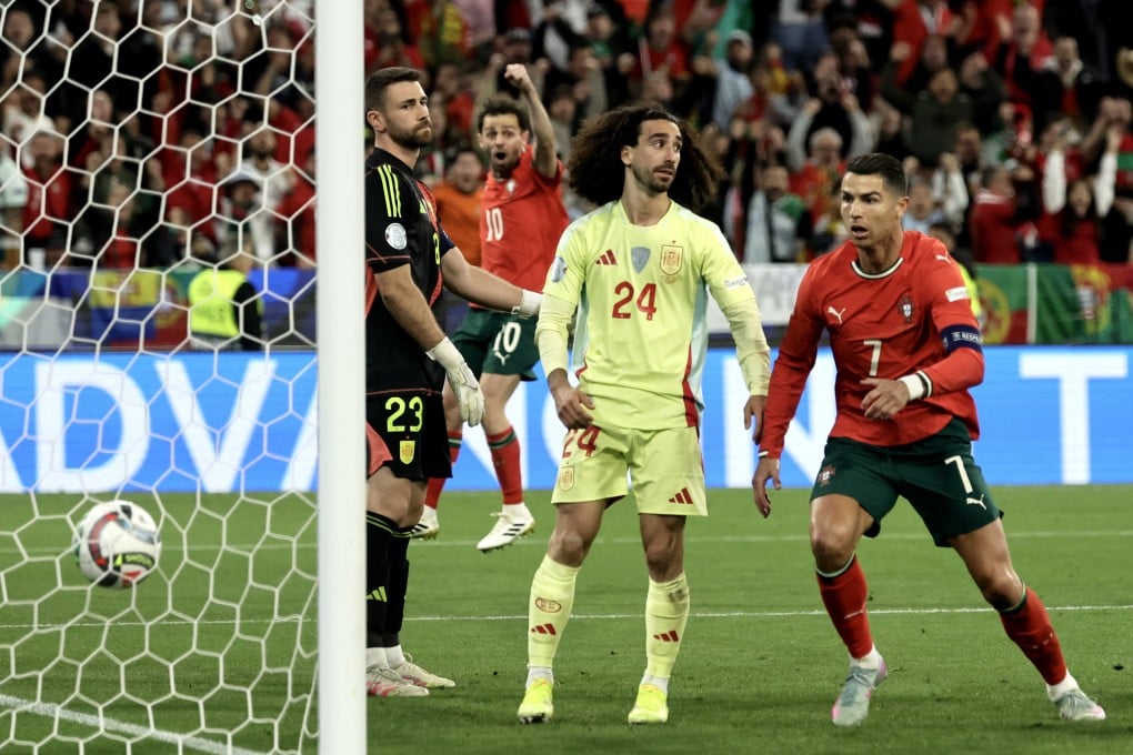 Cristiano Ronaldo (right) scores for Portugal to make it 2-2 in the Uefa Nations League final against Spain in Munich on Sunday. Photo: EPA-EFE
