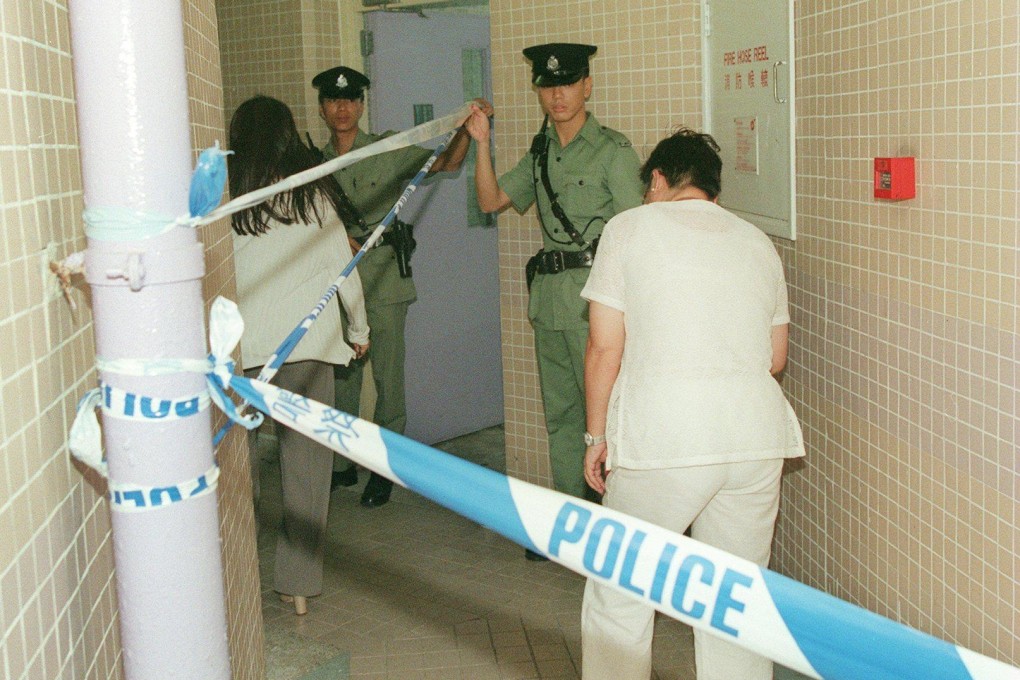 Police mount an investigation at a flat in Tin Shui Wai Estate where the bodies of five people were found after an apparent murder-suicide in 1999. Photo: SCMP Archives