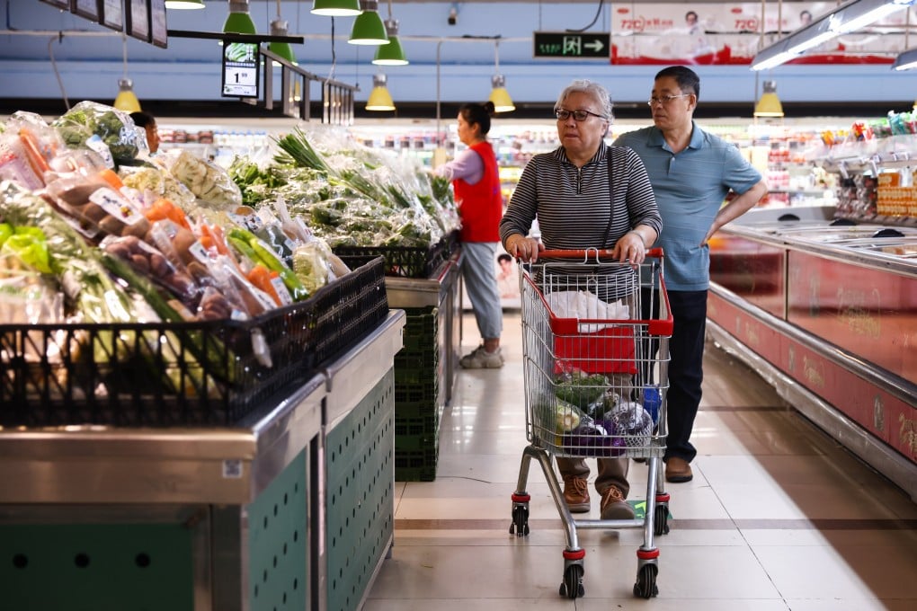 People shop in a supermarket in Beijing, China, on May 19, 2025. Photo: EPA-EFA
