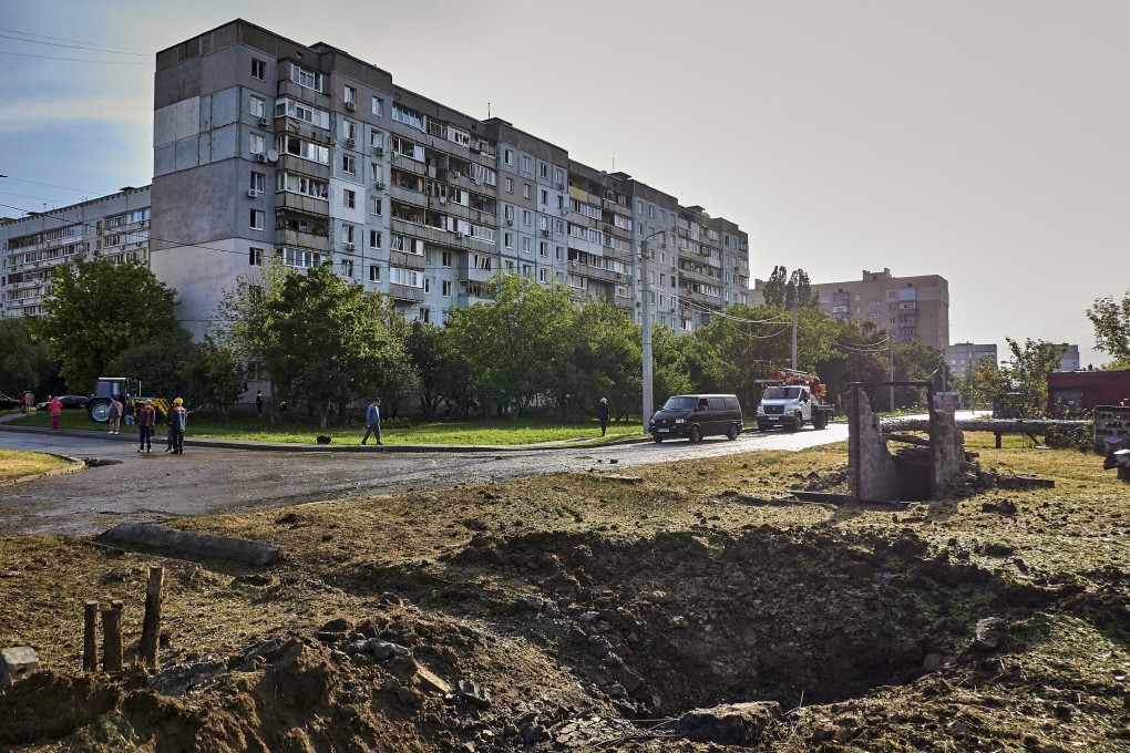A crater at the site of a fatal drone strike in Kharkiv in northeastern Ukraine on Saturday. Photo: EPA-EFE