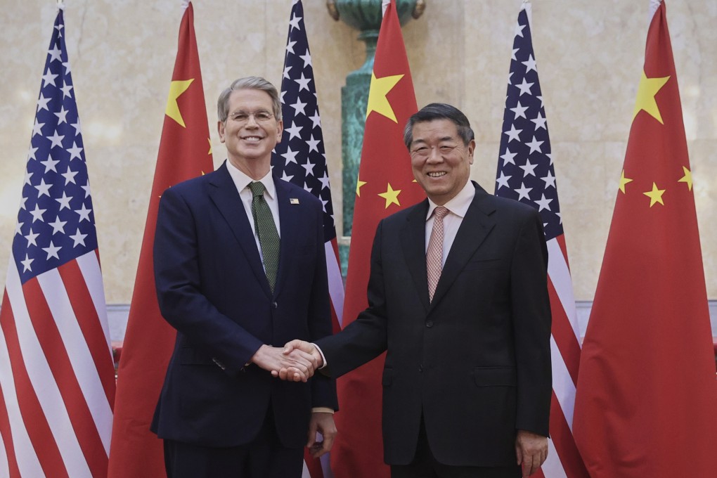 Chinese Vice-Premier He Lifeng, right, shakes hands with US Treasury Secretary Scott Bessent ahead of the start of trade talks in London on Monday. Photo: AP