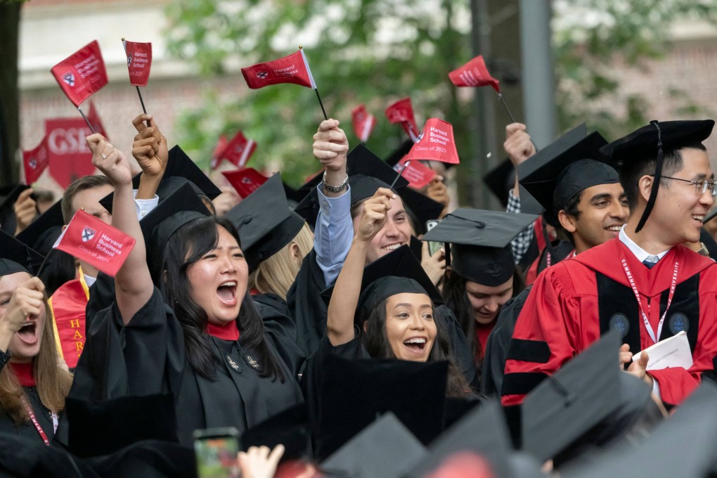 Students cheer during the 374th Harvard Commencement on May 29. The school has been a frequent target of US President Donald Trump as he pushes for strict oversight on admissions and hiring. Photo: AFP