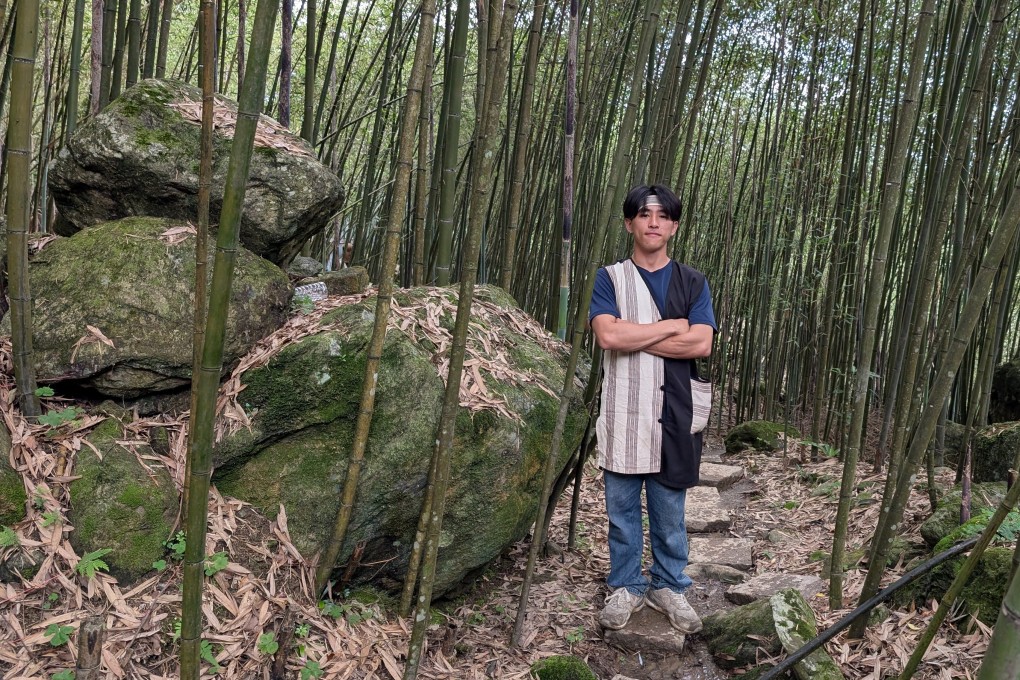 Dai Xinzhe, known by his Truku tribal name Doubi, in a bamboo forest in eastern Taiwan his ancestors once called home. He leads tours that showcase the culture and heritage of the aboriginal tribe. Photo: Lisa Cam
