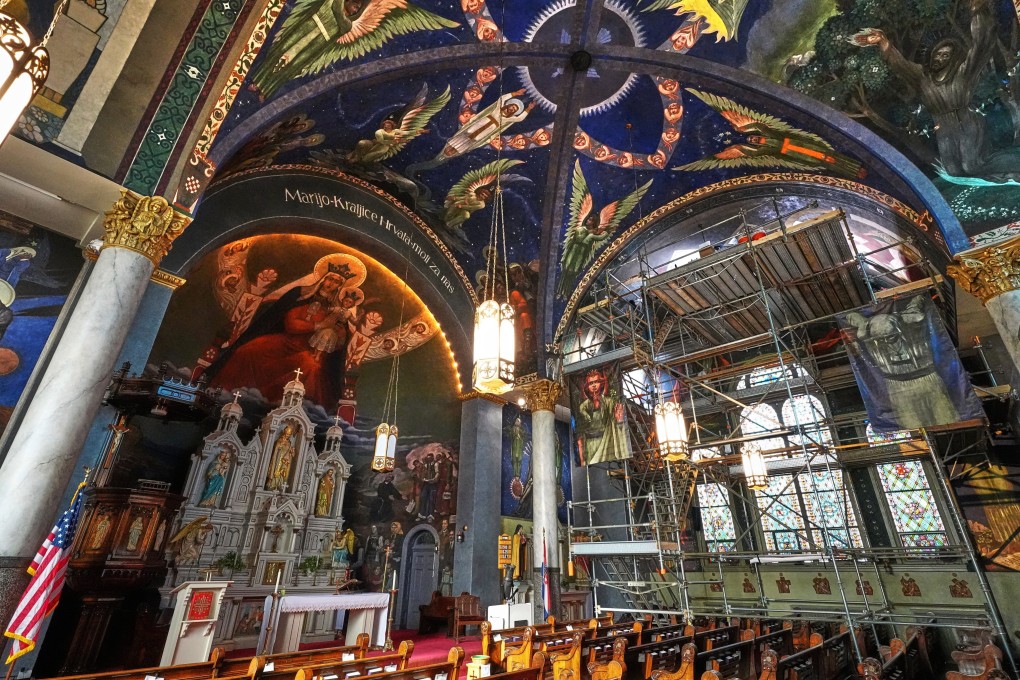 Maxo Vanka’s decades-old murals on the ceiling and walls of St Nicholas Croatian Catholic Church in Pittsburgh. Efforts to restore them have been underway since 2009. Photo: AP