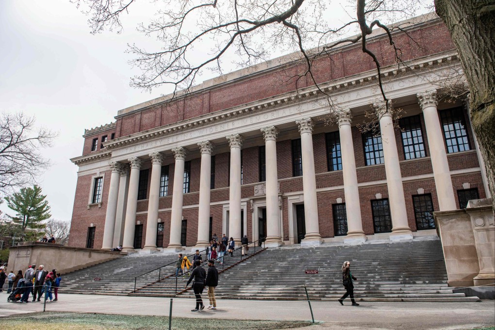People enter and exit the Harry Elkins Widener Memorial Library on the Harvard University campus in Cambridge, Massachusetts. Photo: AFP