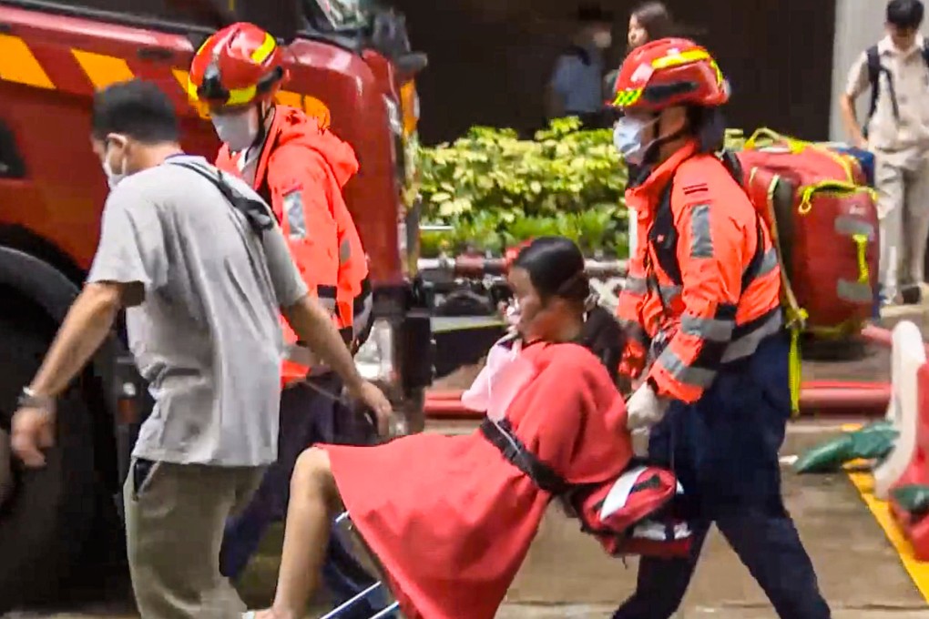 Hong Kong firefighters rescued a 17-year-old girl from a fire on Wednesday. Photo: Cable TV News