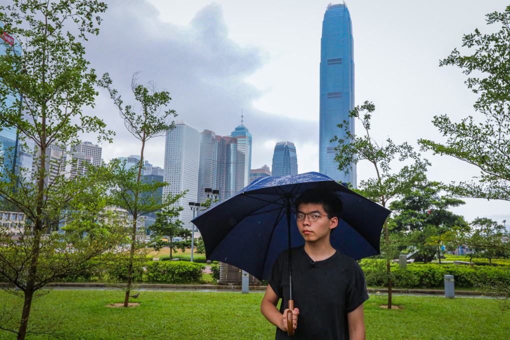 China’s foreign ministry arm in Hong Kong has said local police will handle Joshua Wong’s case in accordance with the law. Photo: Felix Wong