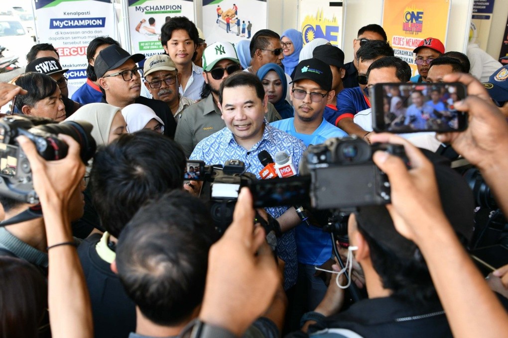 The popularity of Rafizi Ramli (centre) has been growing since he resigned on May 28. Photo: Facebook/Rafizi Ramli