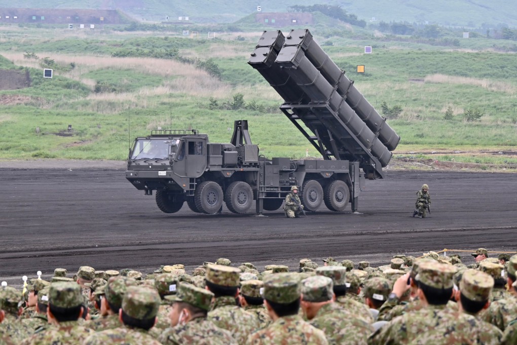 A Type 12 anti-ship missile launch vehicle takes part in Sunday’s training exercise near Mount Fuji.
Photo: Handout