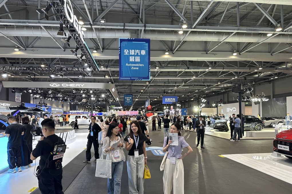 Visitors walk among Chinese electric cars at the 2025 Hong Kong Automotive Expo at Asia-World Expo on June 12, 2025. Photo: Daniel Ren
