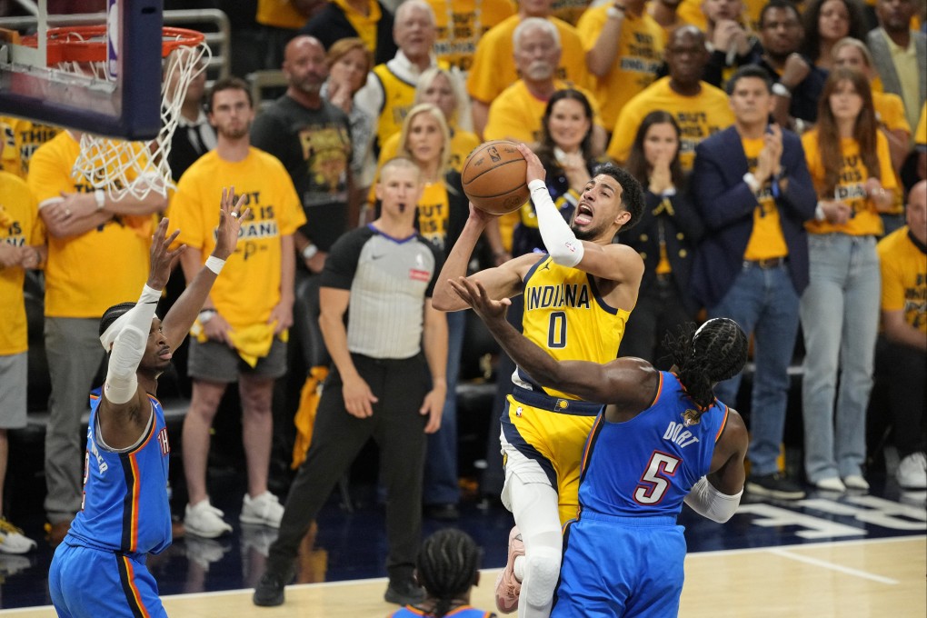 Indiana Pacers guard Tyrese Haliburton shoots with Oklahoma City Thunder’s Luguentz Dort in attendance during game three of the NBA Finals. Photo: Kyle Terada-Imagn Images