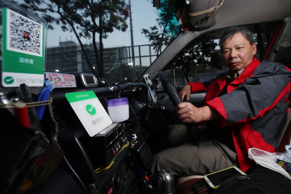 WeChat Pay Hong Kong has been offering taxi drivers perks such as zero handling fees. Photo: Edward Wong
