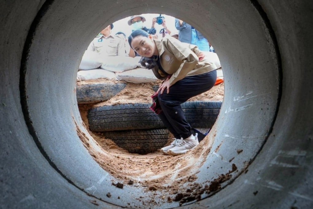 Thai Prime Minister Paetongtarn Shinawatra inspects a bomb shelter, built by villagers, during a trip to the Kap Choeng border district on Wednesday. Photo: Thai Government Handout/EPA-EFE