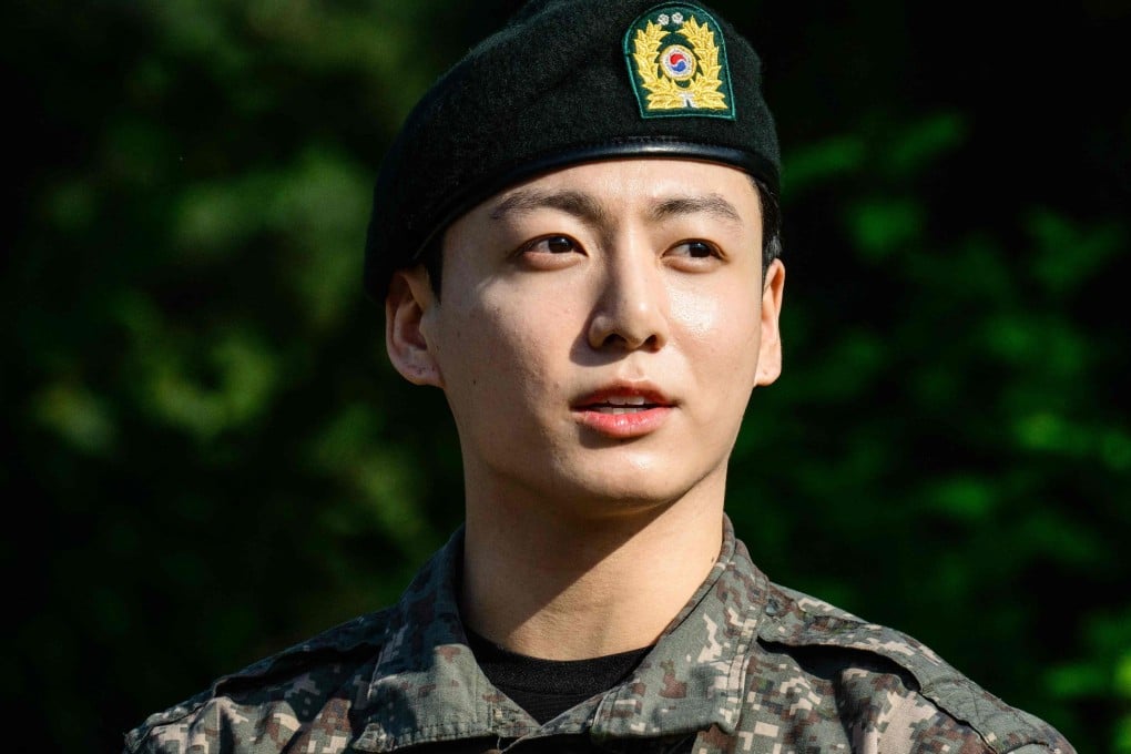 Jungkook greets fans shortly after his and Jimin’s release from 18 months of South Korean military service on Wednesday. Photo: AFP