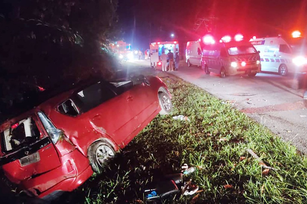 An accident scene after a minivan collided with a bus in Malaysia. Photo: Perak Fire and Rescue Department/AFP