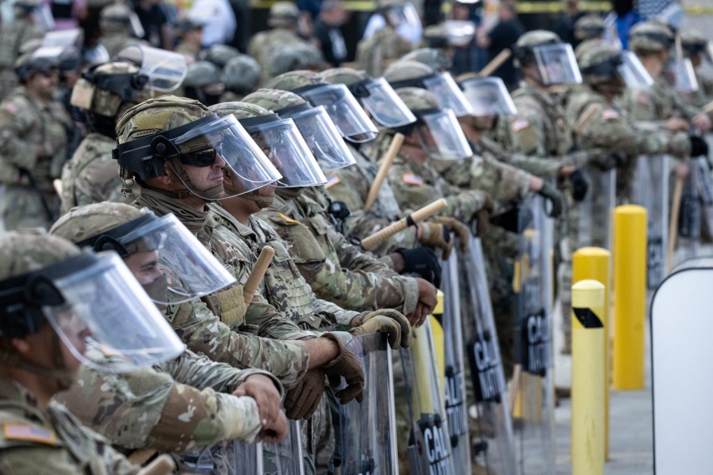 National Guard troops in front of the Metropolitan Detention Centre in Los Angeles. Photo: TNS