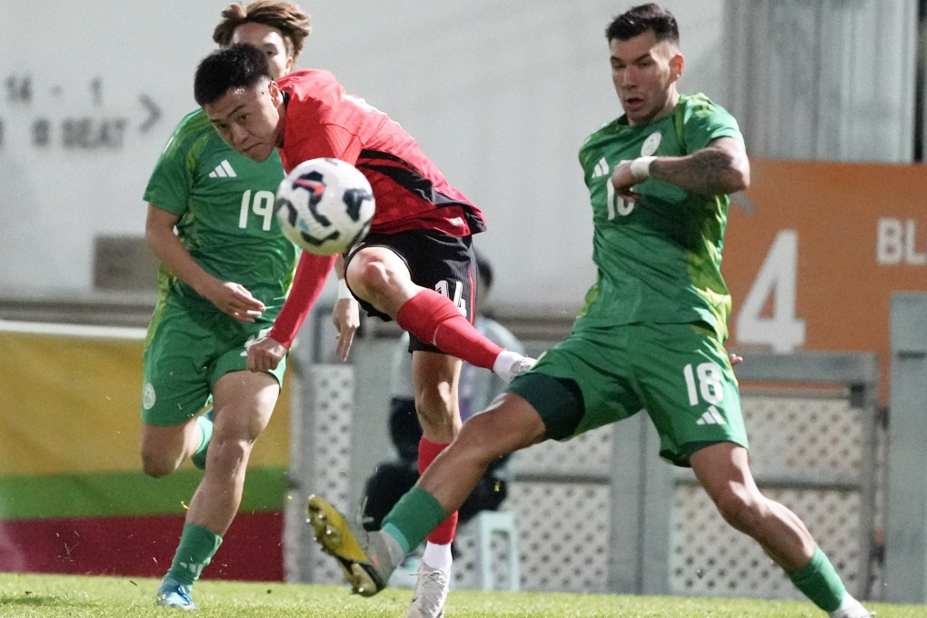 Hong Kong’s Jesse Yu Joy-yin (red shirt) takes on Macau when the teams met in March. Photo: Sam Tsang
