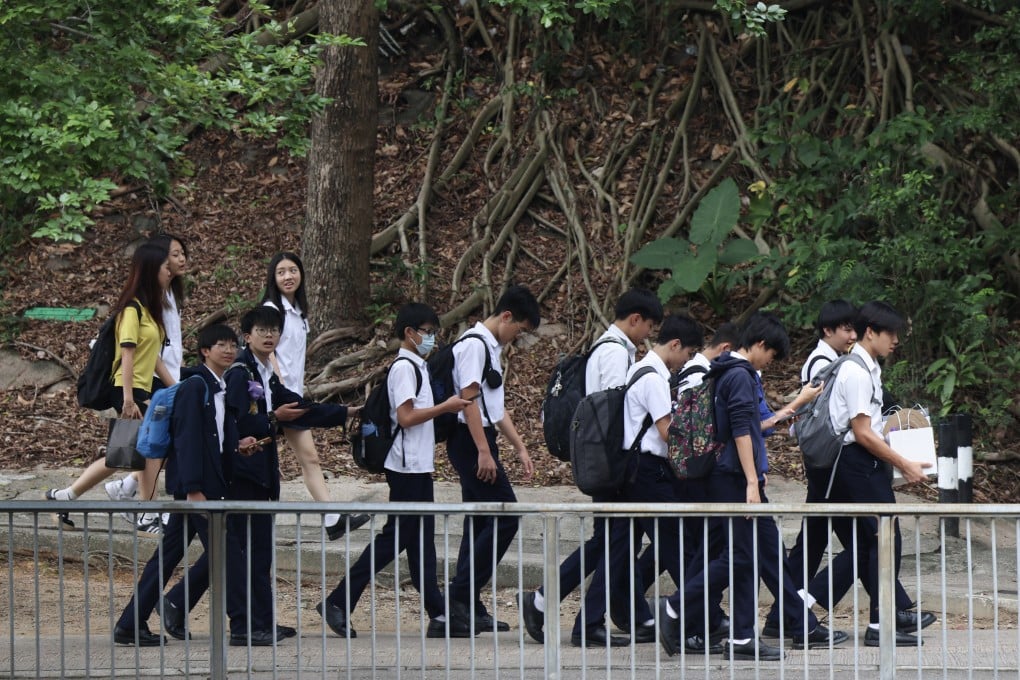 Secondary school students walk along a footpath in Fo Tan. Photo: Jelly Tse