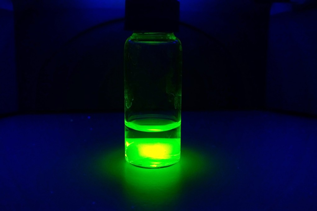 A glass tube with quantum dots of glowing perovskite nanocrystals. Chinese researchers say they have found a way to enhance the stability of PeLEDs, a breakthrough that could significantly extend their lifespan. Photo: Shutterstock