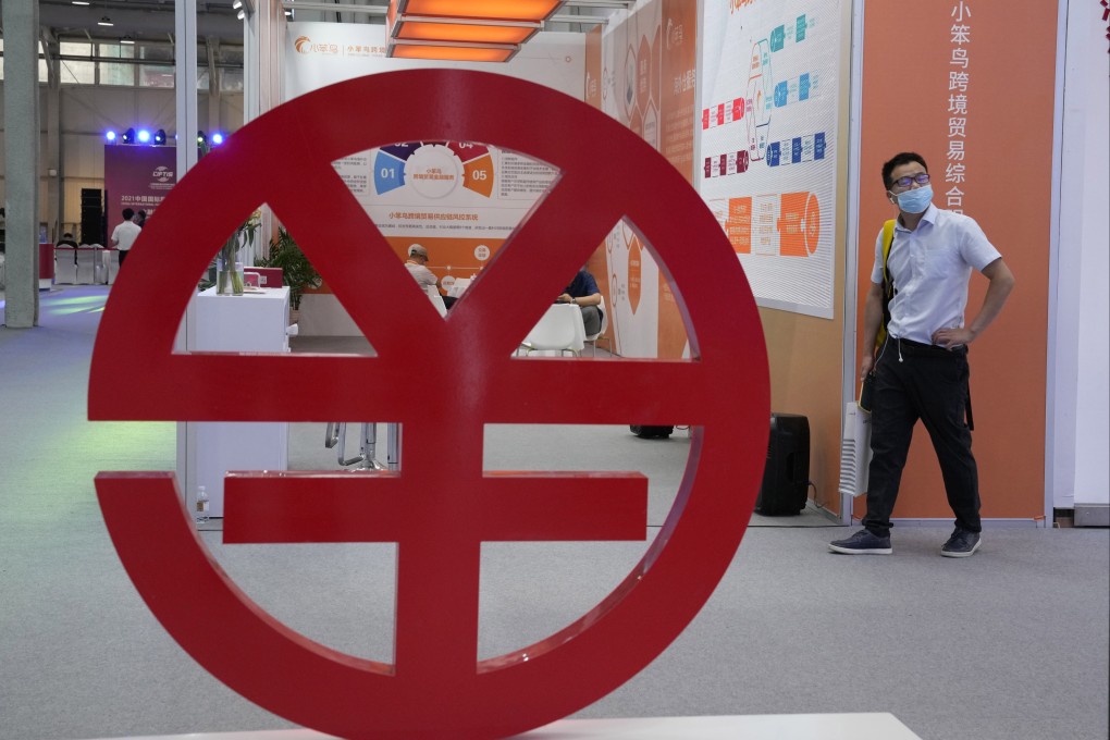 An e-CNY logo at the China International Fair for Trade in Services (CIFTIS) in Beijing in 2021. A well-regulated yuan stablecoin issued from Hong Kong could serve as a strategic tool for China’s yuan internationalisation efforts. Photo: AP