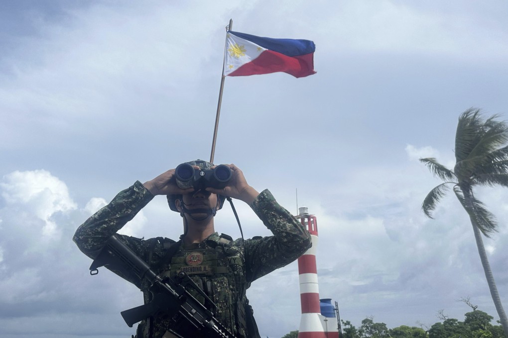 A Philippine marine stands guard at West York Island, locally called Likas Island, one of the Philippine-occupied islands in the South China Sea. Photo: AP