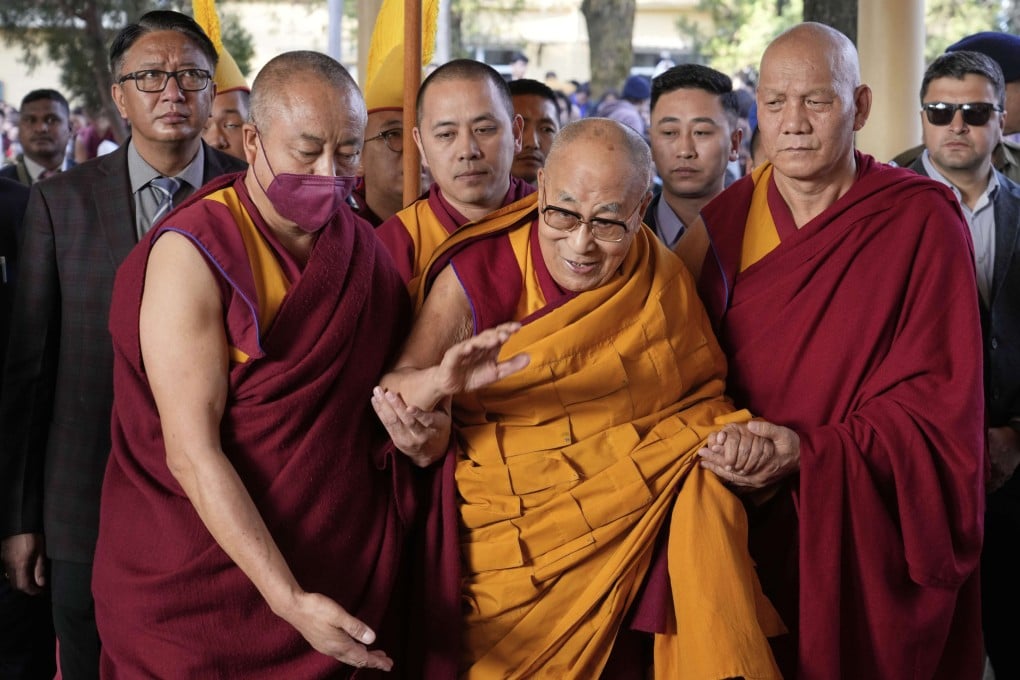 The Dalai Lama (centre) arrives at a temple in Dharamsala, India on March 14 to deliver a sermon. The EU has called for the Tibetan spiritual leader’s successor to be selected without “government interference”. Photo: AP