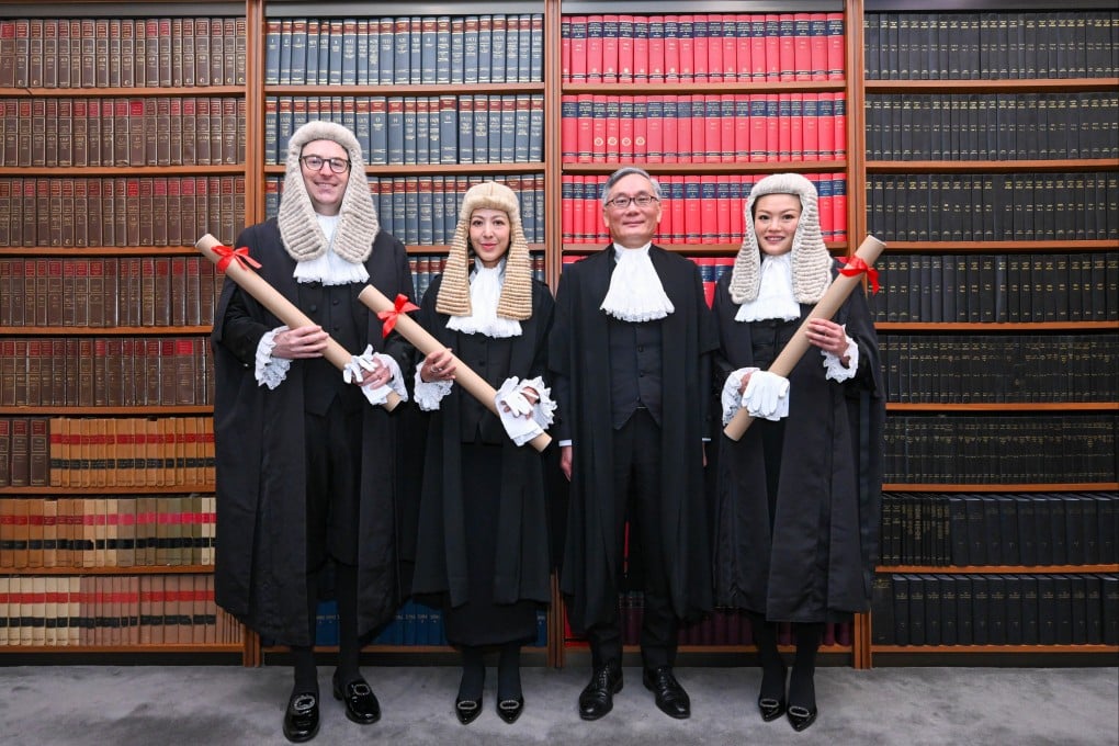 Chief Justice Andrew Cheung (second right) poses with the three newly appointed senior counsel: Timothy Parker (left), Catrina Lam (second left) and Priscilia Lam. Photo: Handout