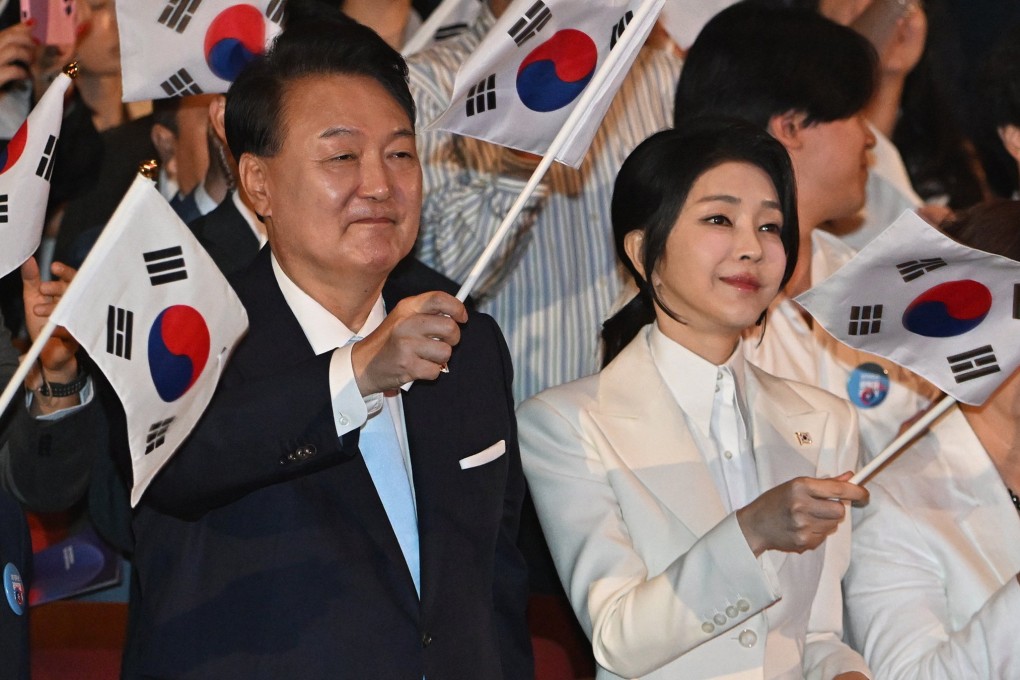 Former South Korean president Yoon Suk-Yeol (left) and his wife Kim Keon-Hee celebrating National Liberation Day on August 15, last year.  Photo: EPA-EFE