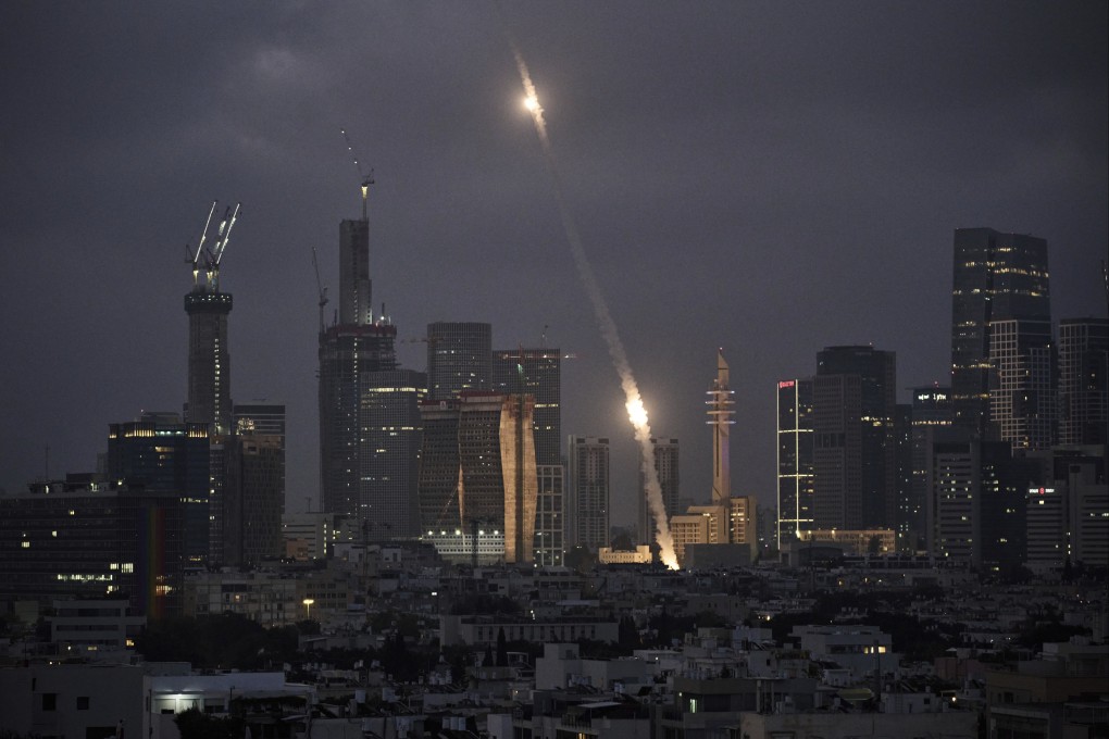 Israel’s Iron Dome air defence system fires to intercept projectiles over Tel Aviv. Photo: AP