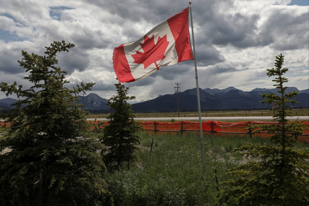 A Canadian flag flies near the mountains ahead of the G7 summit, near Kananaskis, Alberta, Canada, on Saturday. Photo: Reuters