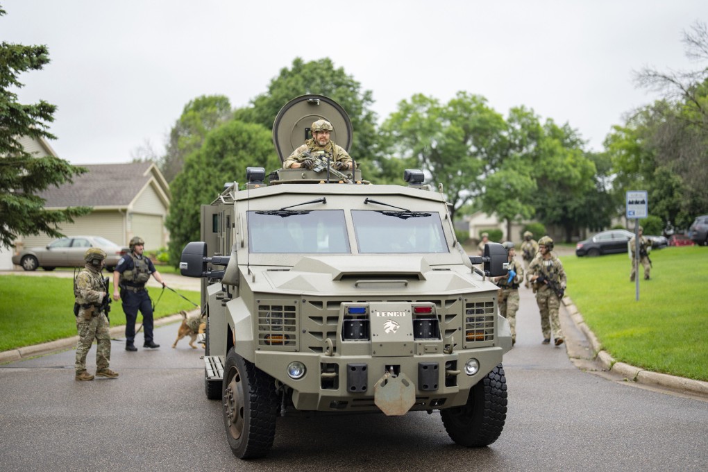 Armed FBI agents sweep a neighbourhood adjacent to the home of lawmaker Melissa Hortman in Brooklyn Park, Minnesota, on June 14. Photo: Star Tribune via AP