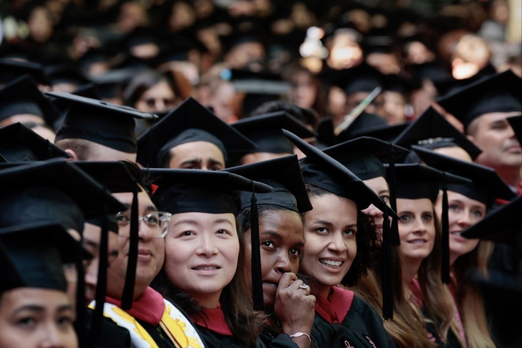 Students take part in a commencement ceremony at Harvard University on May 25. Photo: The Boston Globe / Getty Images