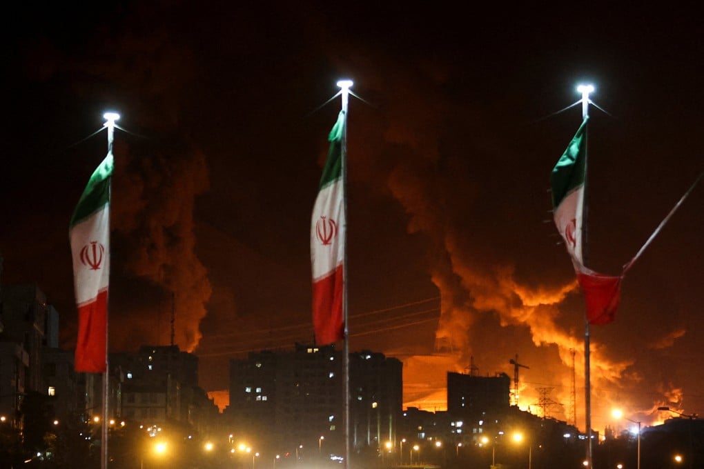 Fire and smoke from an Israeli attack on Sharan oil depot in Tehran, Iran. Photo: West Asia News Agency via Reuters