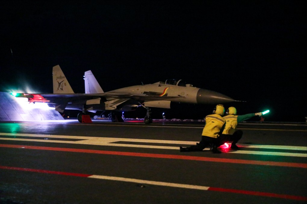 A J-15 fighter jet takes off from one of the PLA
Navy’s two aircraft carriers during a training exercise in the Western Pacific in early June. Photo: Handout