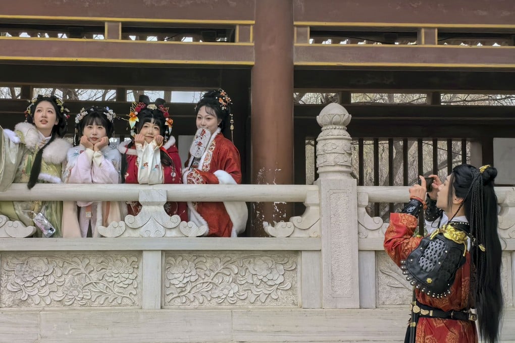 Photoshoots at popular tourist destinations in traditional Chinese clothing are one of several trends that have led to a suite of “emergent” careers. Photo: Simon Song