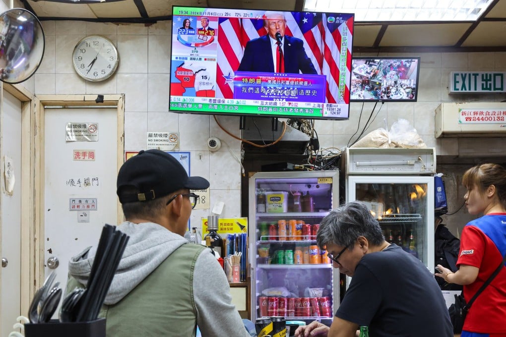 People watch the news in an eatery on Choi Hung Estate on November 6. Photo: Edmond So