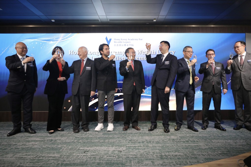 Adrian Cheng (fourth from left), chairman of the Hong Kong Academy for Wealth Legacy (HKAWL), and (fifth from left) Secretary for Financial Services and the Treasury Christopher Hui, at the launch of the academy on November 14, 2023. Photo: Xiaomei Chen
