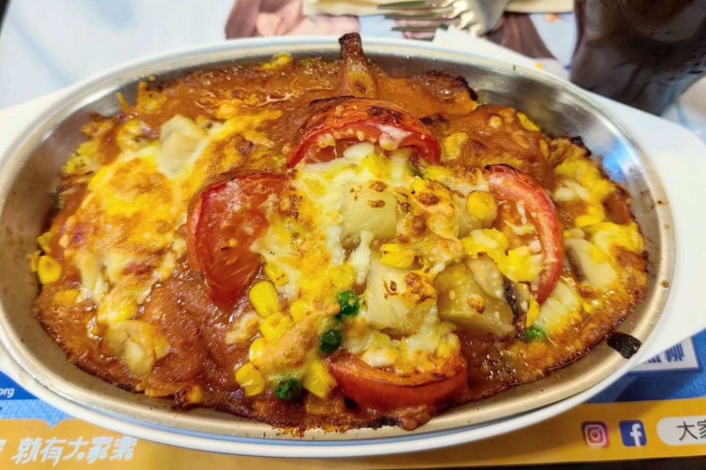 Baked pork chop rice at Café de Coral. The Hong Kong fast-food chain recently applied for the dish to be added to the city’s list of intangible cultural heritage. Photo: Instagram/elkstremelydelicious