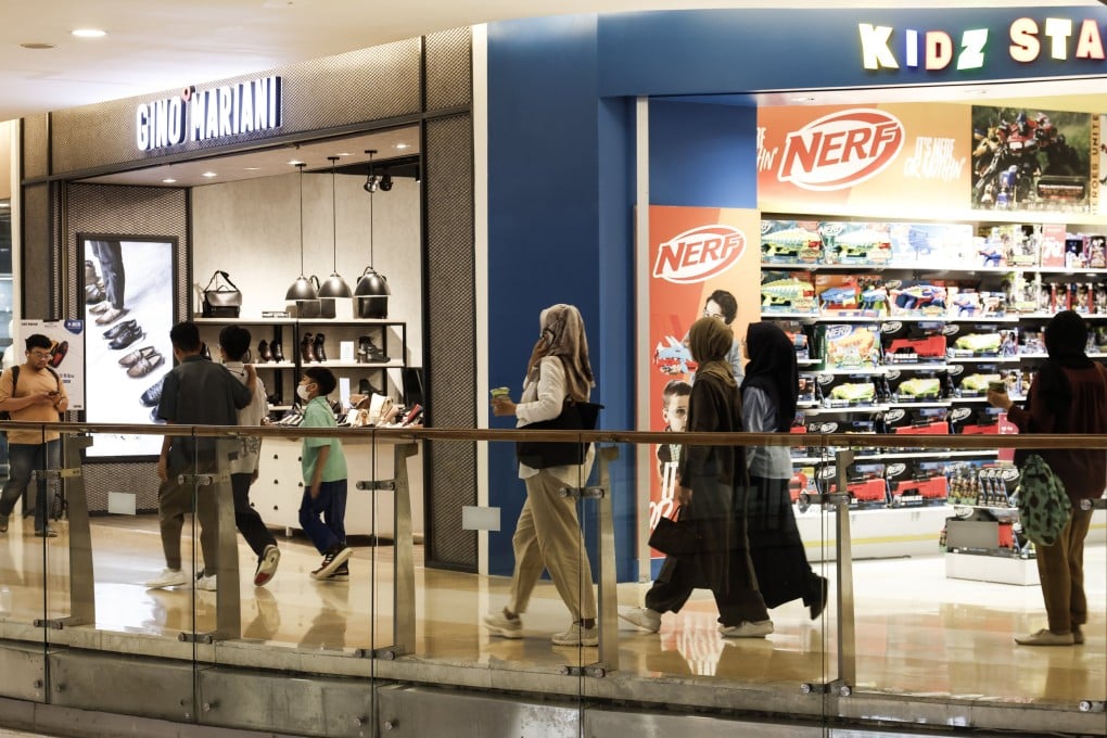 Indonesians in Kuningan City mall in Jakarta on May 21. The government is hoping its stimulus package will revive the economy. Photo: EPA-EFE