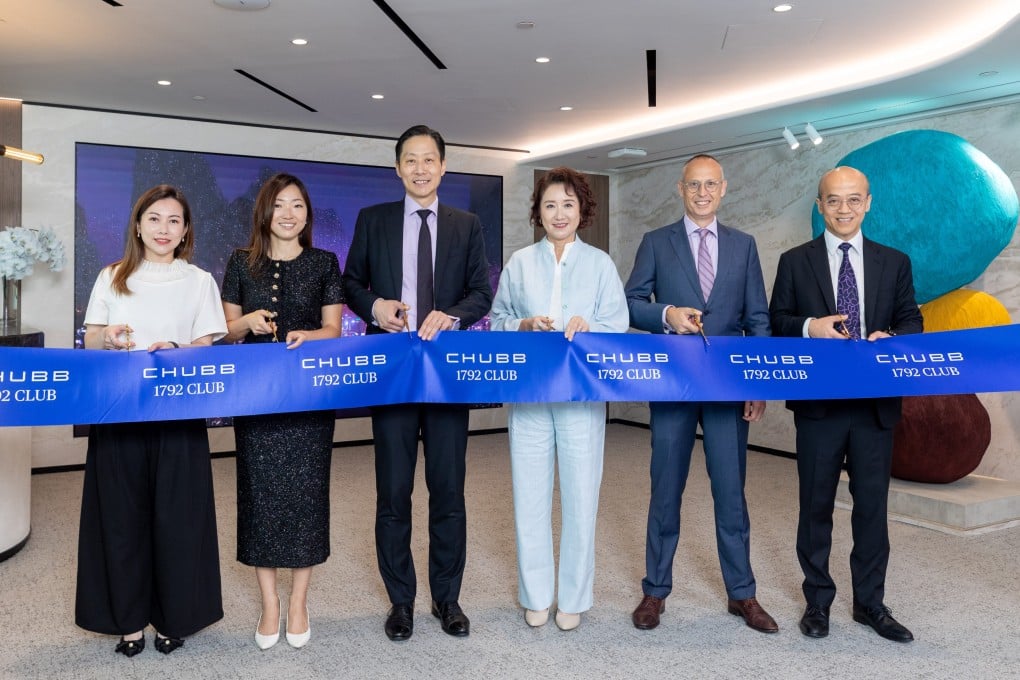 Cutting the ribbon on the Chubb 1792 Club wealth centre are (from left) Joan Tam, head of brokerage, Chubb Life Hong Kong; Ivy Cheung, chief marketing officer, Chubb Life Hong Kong; Eric Ng Tung-hing, global chief financial officer, Chubb Life; Belinda Au, president of Hong Kong and head of North Asia, Chubb Life Hong Kong; Bryce Johns, global president, Chubb Life; and William Man, chief operation officer, Chubb Life Hong Kong.