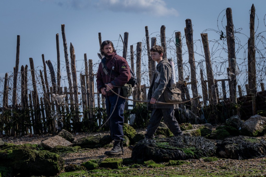 Aaron Taylor-Johnson (left) and Alfie Williams in a still from 28 Years Later, directed by Danny Boyle, which will release in cinemas this week.