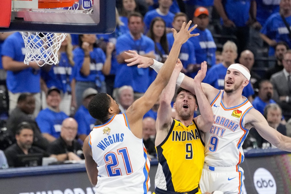 Oklahoma City Thunder guards Aaron Wiggins (left) and Alex Caruso (right) battle with Indiana Pacers’ TJ McConnell in Game 5 of the NBA Finals. Photo: Reuters