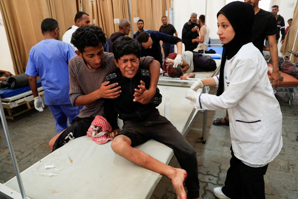 Palestinians wounded while waiting for aid, being treated at Nasser hospital in Khan Younis, southern Gaza. Photo: Reuters