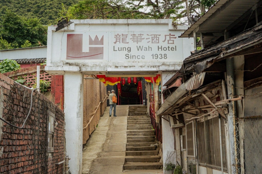 Lung Wah Hotel is hidden next to the East Rail Line in Sha Tin, Hong Kong. Photo: Gavin Yeung