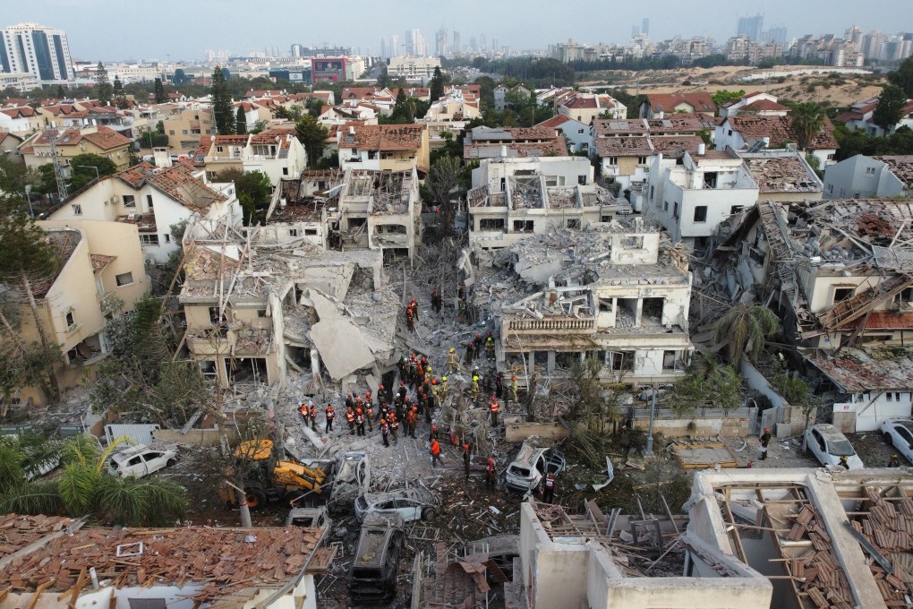 Rescue workers at a site damaged by Iranian missile strikes in Rishon LeZion, near Tel Aviv, Israel. China has said it wants to play a “constructive” role in securing peace. Photo: EPA-EFE
